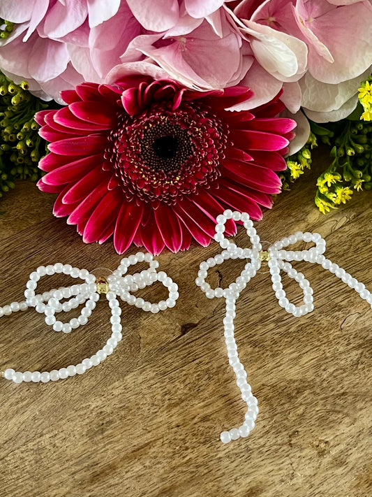 Boucles d’oreilles noeud en perles