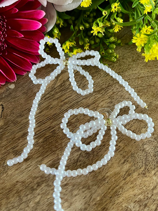 Boucles d’oreilles noeud en perles
