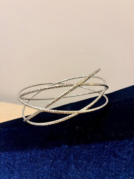 Manchette croisée argentée