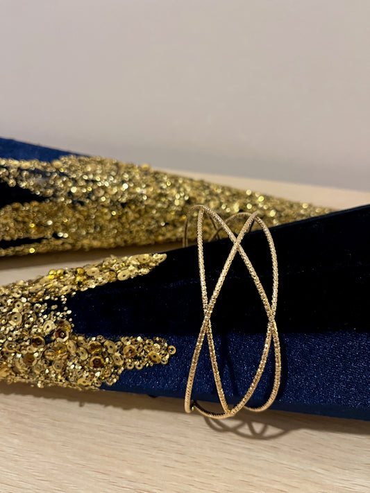 Manchette croisée dorée